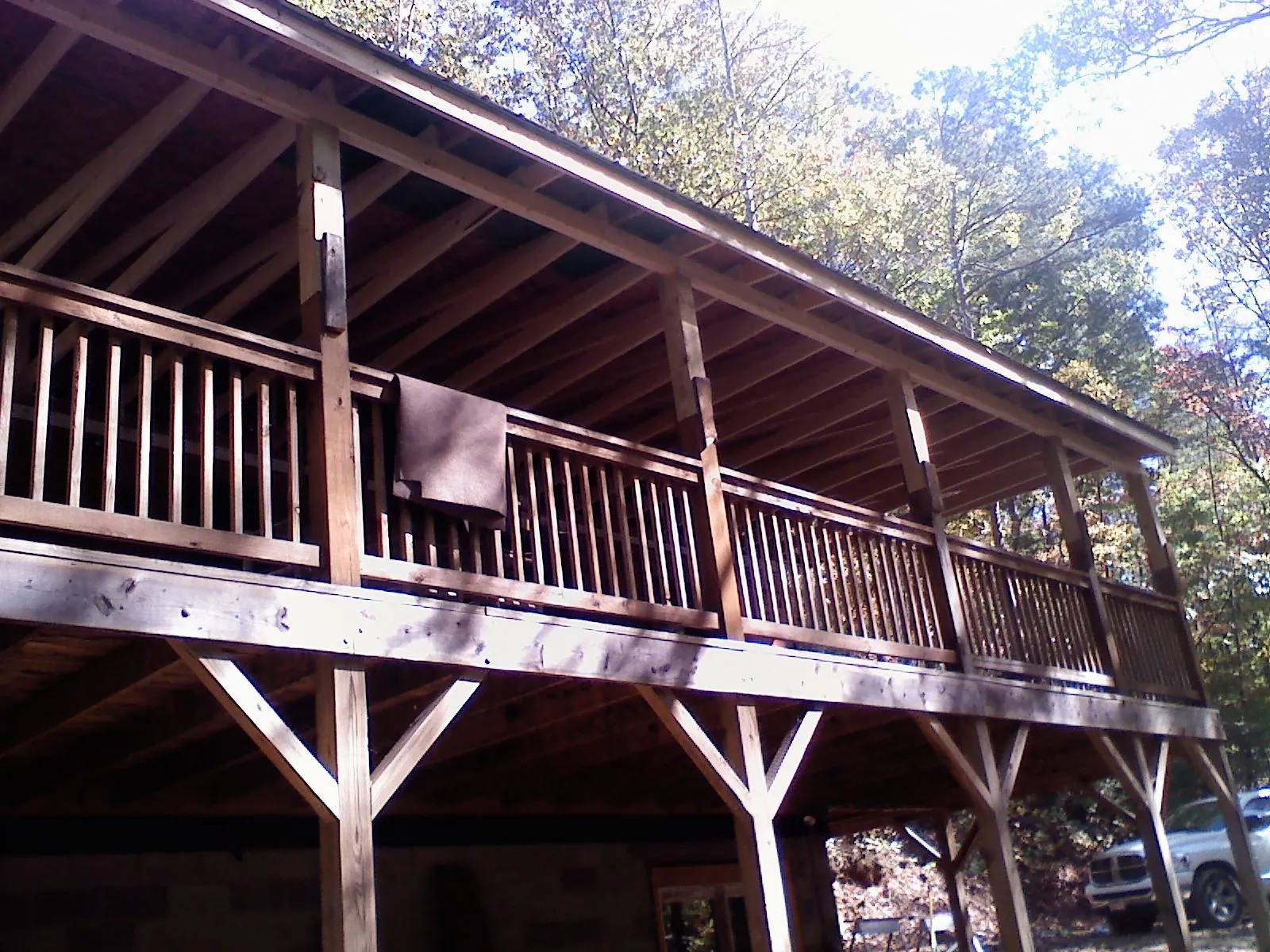 Timber framing under a new elevated porch and deck — Roof Leak Repair in Smithmill by Roofing Brothers